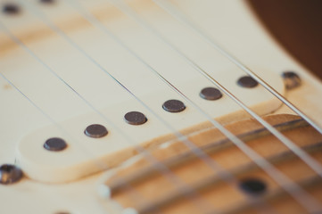 Electric guitar pick up detail, music symbol