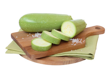 Green zucchini on the board