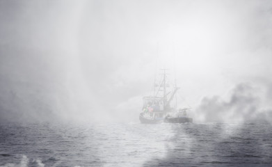 Alaska fishing trawler with fog overlay