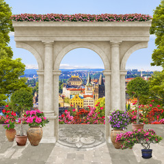 Old arch with flowers and trees with height city view