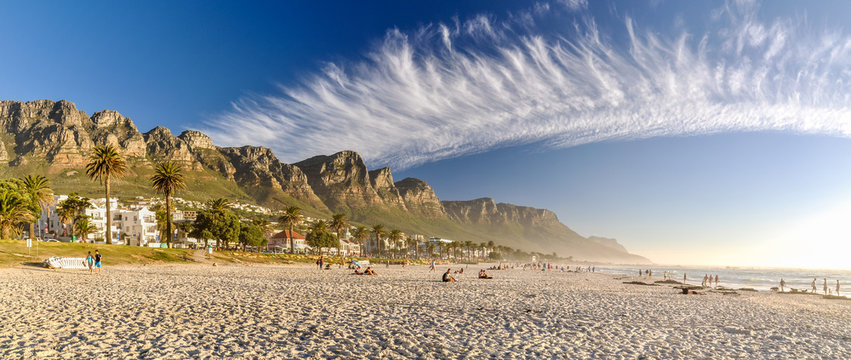 Stunning XXL panorama of Camps Bay, an affluent suburb of Cape Town, Western Cape, South Africa. With its white beach, Camps Bay attracts a large number of foreign visitors as well as South Africans.