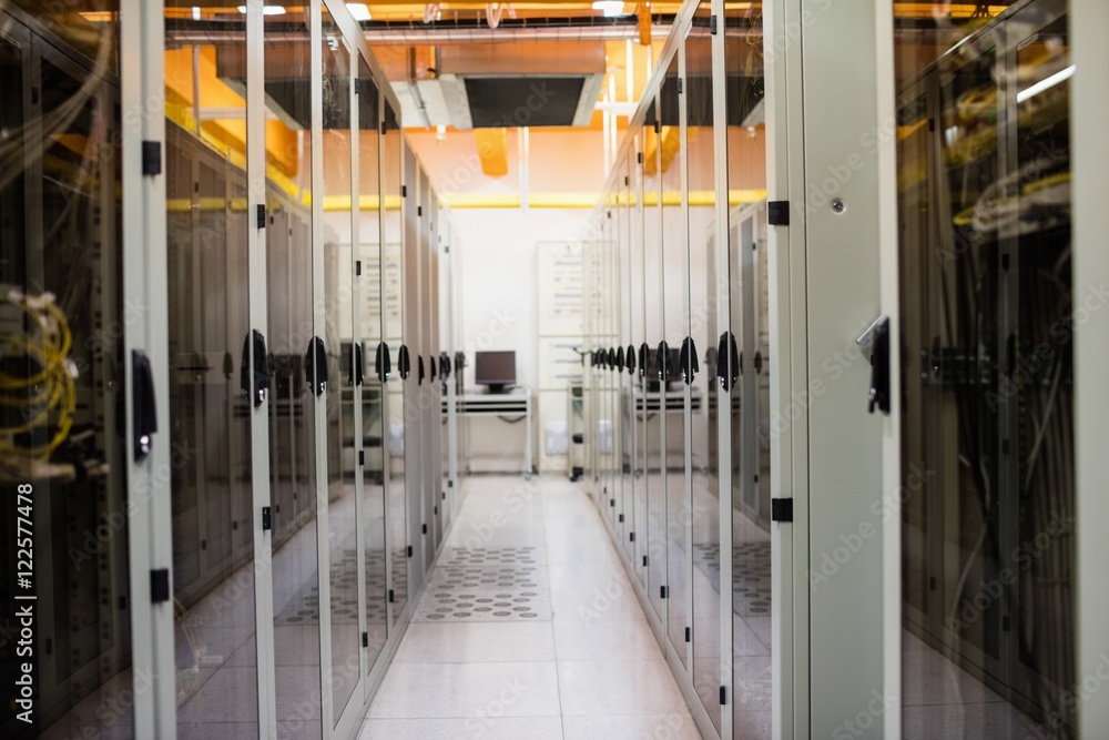 Poster hallway with a row of servers