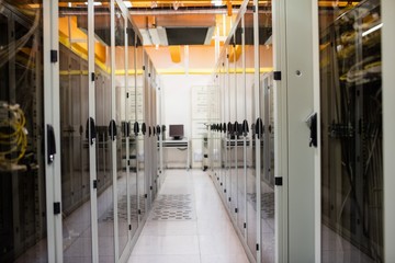 Hallway with a row of servers