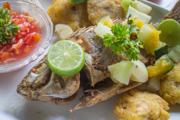 Fried fish with tostones, Nicaragua food. General travel imagery