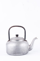 old vintage retro Kettle on white background drink isolated (front view). Which, kettle made of...