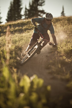 A male mountain biker rides the 401 Trail, Crested Butte, CO
