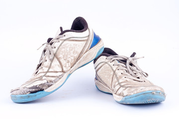 Old vintage damaged futsal sports shoes  on white background  isolated 
