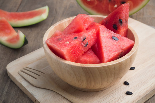 Kitchen table with Sliced of watermelon.