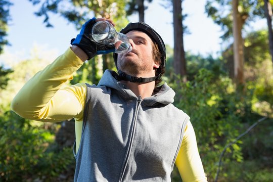 Mountain biker drinking water
