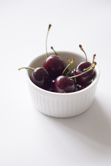 A pot of fresh cherries