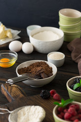 Grated chocolate with different ingredients for cooking chocolat