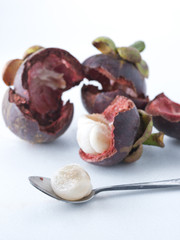 Fresh mangosteen fruit on white background