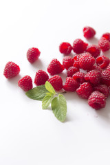 Fresh raspberries, white background