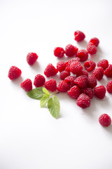 Fresh raspberries, white background