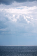 Obraz premium Beautiful seascape of blue sea and sky with clouds