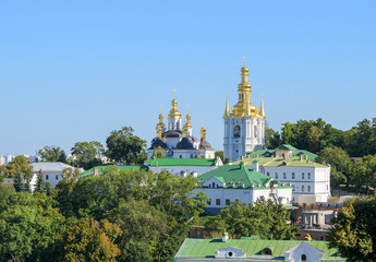 Fototapeta na wymiar Orthodox Christian monastery, Pechersk Lavra in Kiev on green hills of Pechersk. Ukraine