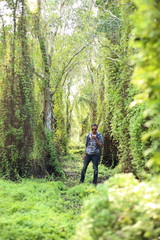 Fototapeta premium Man and Green Wetland Forest in Rayong at Thailand
