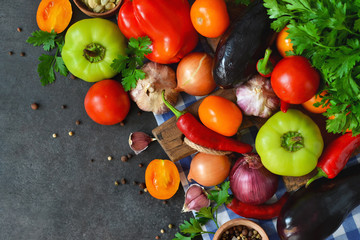 Vegetable salad with spinach, tomato and cucumber on a concrete