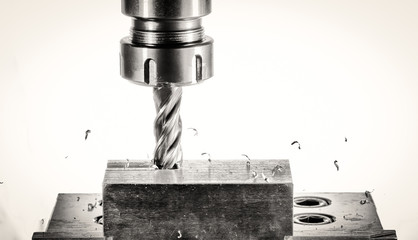 cnc milling machine - spindle with cutter, flying metal splinter - obrazy, fototapety, plakaty