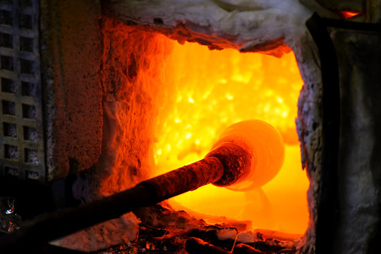 glass melting in a traditional oven of a glassblower manufacture
