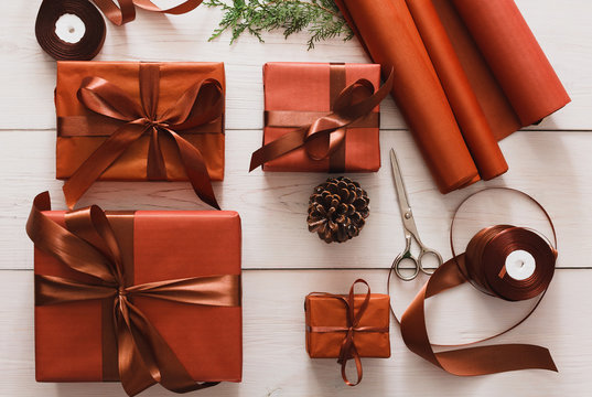 Top view of christmas present boxes on white wood background