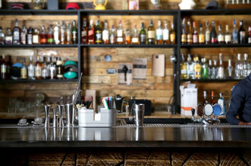 Different beverages on bar counter in modern cafe - obrazy, fototapety, plakaty