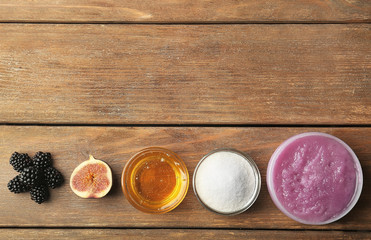Homemade facial mask with natural ingredients on wooden background