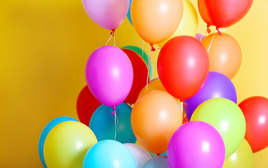 Fototapeta na wymiar Colorful birthday balloons, closeup