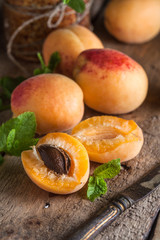 Fresh apricots on the wooden rustic table