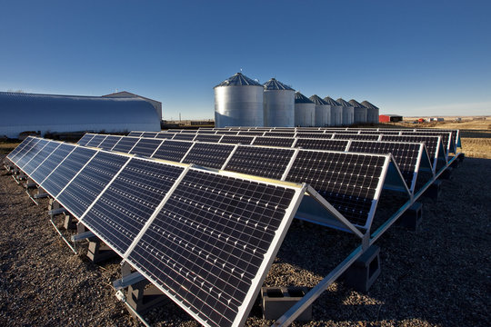 Solar panels on farm near Calgary, Alberta, Canada.
