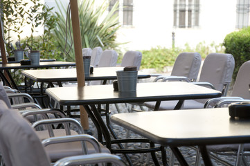 tables of street cafe in the Italian city