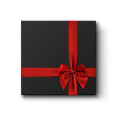 Blank black gift box with red ribbon.