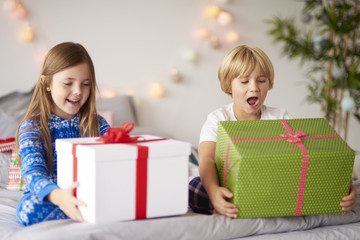 Fototapeta na wymiar Happy kids with Christmas presents