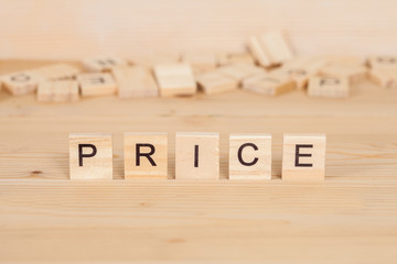 Price word written on wood cube