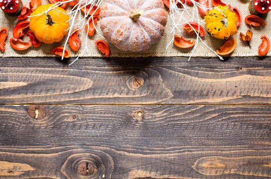 Halloween pumpkins, on wooden background