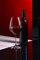  bottle and glass with red wine