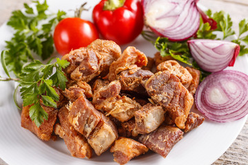 Salty pork greaves