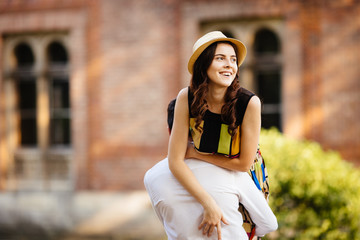 Hip young couple having fun on a sunny day in the city