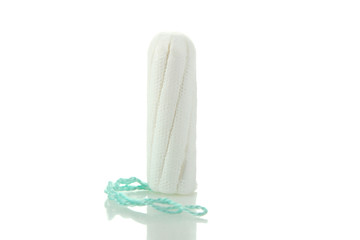 Menstrual tampon isolated on a white background. Menstruation time. Hygiene and protection.