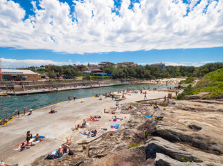 Fototapeta na wymiar Sydney, Australia, 07/07/2016, Bondi to Bronte Ocean Walk, Tamarama beach, New South wales. Beautiful blue sky on a warm summers day.