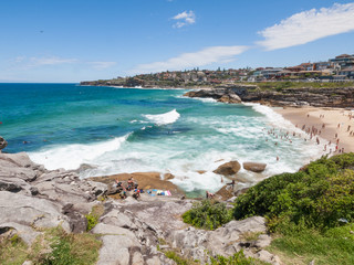 Fototapeta na wymiar Sydney, Australia, 07/07/2016, Bondi to Bronte Ocean Walk, Tamarama beach, New South wales. Beautiful blue sky on a warm summers day.