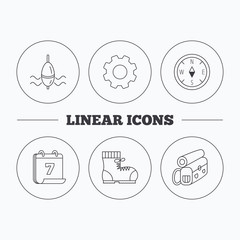 Compass, fishing float and hiking boots.