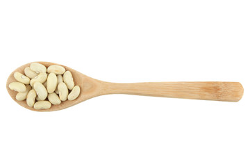 Beans in a wooden spoon isolated on a white background