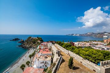 Panoramic view of Almuñécar (Almunecar) with castle walls on a beautiful day, Spain