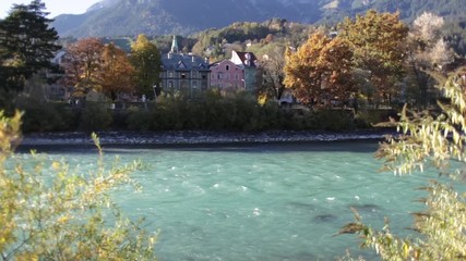 Beautiful view of this colorful afternoon by the Inn river in Innsbruck, Austria