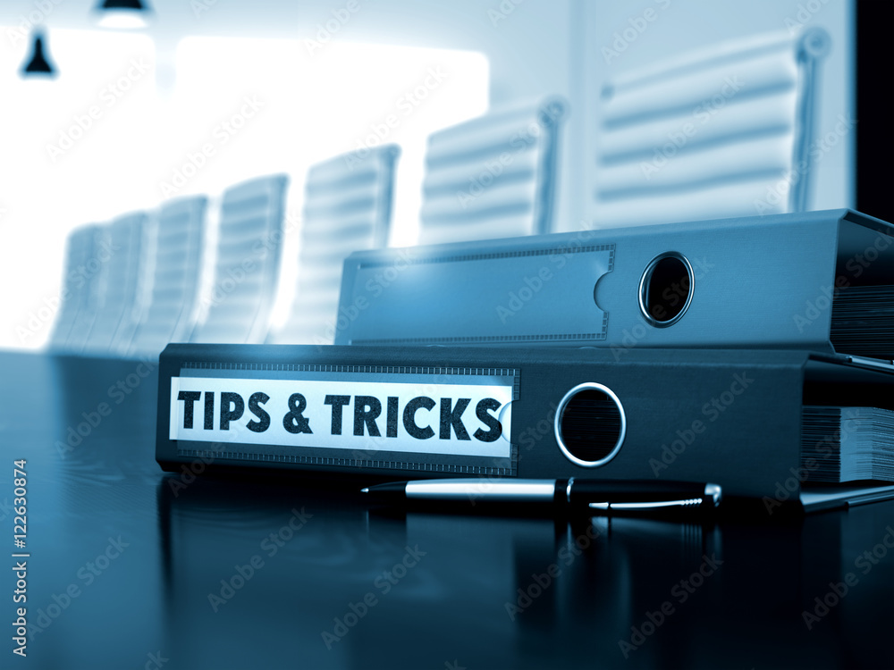 Poster tips and tricks on office binder. blurred image. 3d.