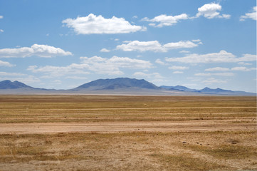 blue sky over the vast Mongolian steppes