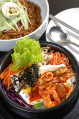 Rice with vegetable in hot bowl Korean food