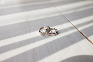 two wedding rings and beautiful shadow