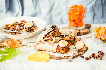 Fototapeta na wymiar homemade granola bars with pumpkin, banana and peanut butter